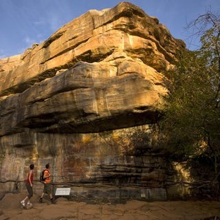 Visitors viewing rock art at Ubirr. Photo: Peter Eve