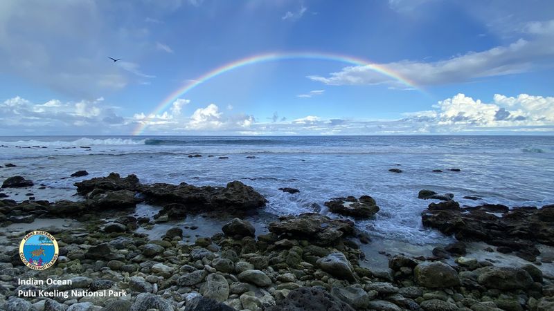 Gaze at this incredible rainbow off the coast of the island| with seabirds circling above to the rhythm of the gentle roar of the Indian Ocean..