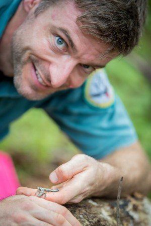 Brendan Tiernan with blue-tailed skinks. Photo: Kirsty Faulkner.