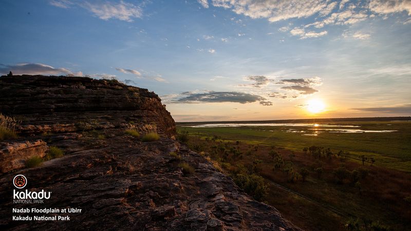 The sun sets over the Nadab floodplain at Ubirr| illuminating the sprawling landscape of the East Alligator (Erre) region - a truly spectacular landscape..