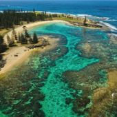 Aerial view of Norfolk Island’s inshore reefs at Slaughter Bay and Emily Bay.
