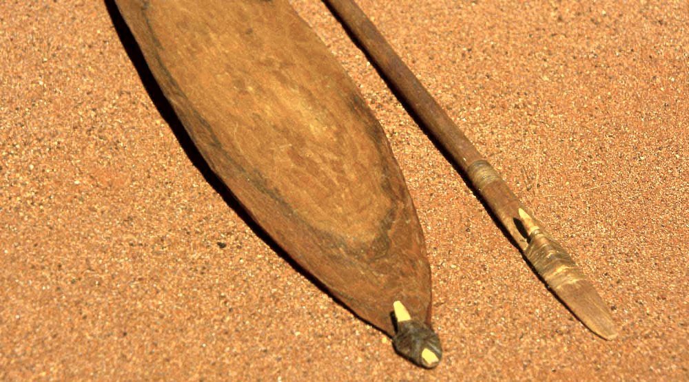 Spear thrower and spear on the ground